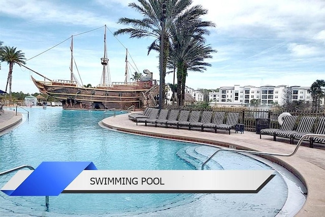 8112 Poinciana Blvd Unit 1502, Orlando, FL 32821 - pool featuring fence