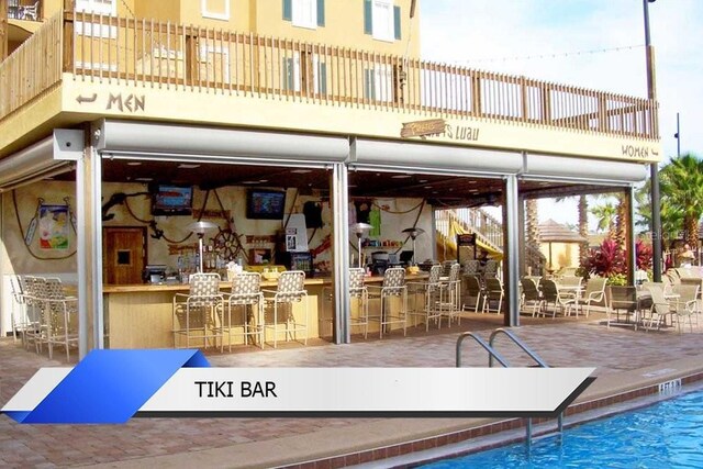8112 Poinciana Blvd Unit 1502, Orlando, FL 32821 - view of swimming pool featuring outdoor dry bar