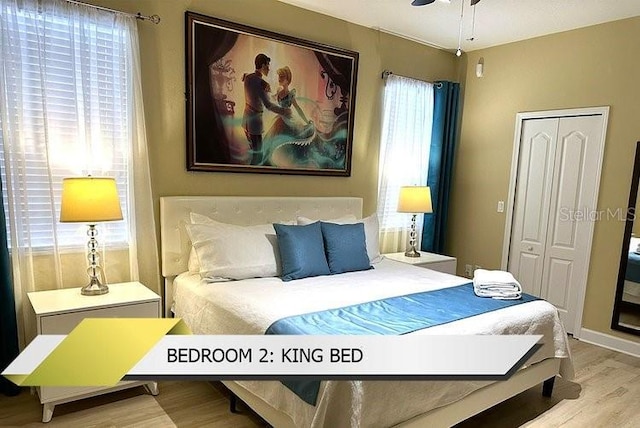 1466 Moon Valley Dr, Champions Gate, FL 33896 - bedroom with a closet and wood finished floors
