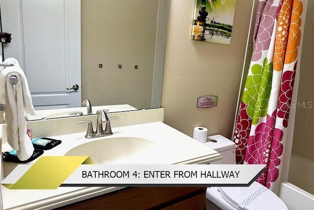 1466 Moon Valley Dr, Champions Gate, FL 33896 - bathroom with toilet, vanity, and shower / bath combination with curtain