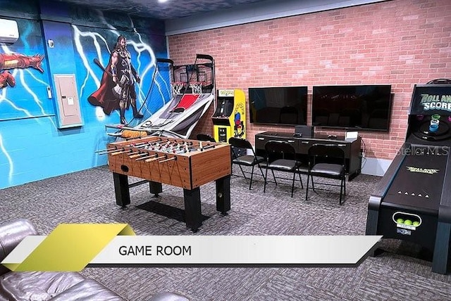 1466 Moon Valley Dr, Champions Gate, FL 33896 - rec room featuring electric panel, carpet flooring, and brick wall