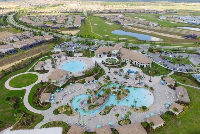 1466 Moon Valley Dr, Champions Gate, FL 33896 - birds eye view of property with a water view and a residential view