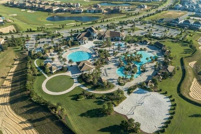 1466 Moon Valley Dr, Champions Gate, FL 33896 - bird's eye view with a water view