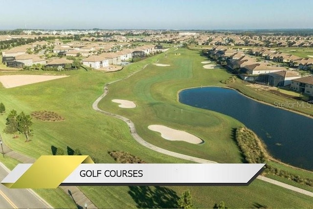 1466 Moon Valley Dr, Champions Gate, FL 33896 - birds eye view of property featuring golf course view, a water view, and a residential view