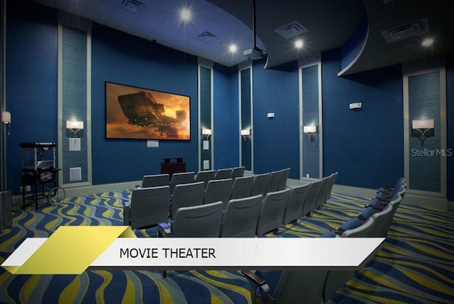 1466 Moon Valley Dr, Champions Gate, FL 33896 - carpeted home theater room with baseboards and visible vents