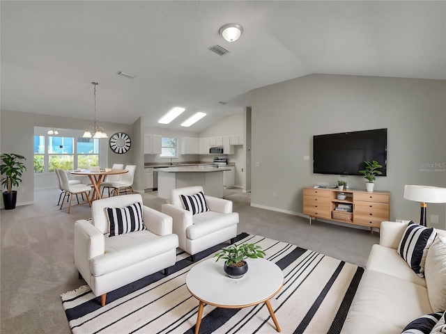 2708 La Posada Dr, The Villages, FL 32162 - living room featuring visible vents, baseboards, lofted ceiling, and light carpet