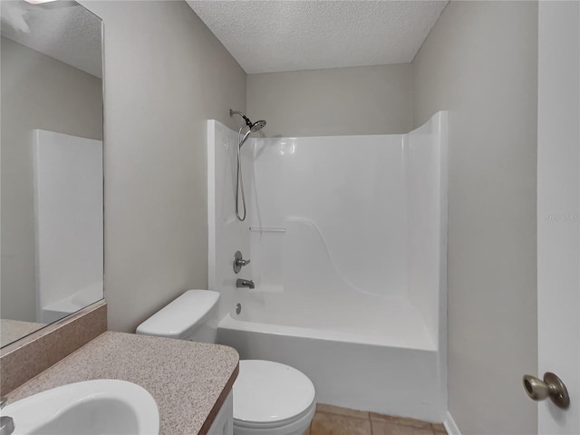 2708 La Posada Dr, The Villages, FL 32162 - full bathroom featuring toilet, washtub / shower combination, a textured ceiling, tile patterned flooring, and vanity