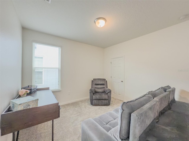living area with carpet flooring and baseboards