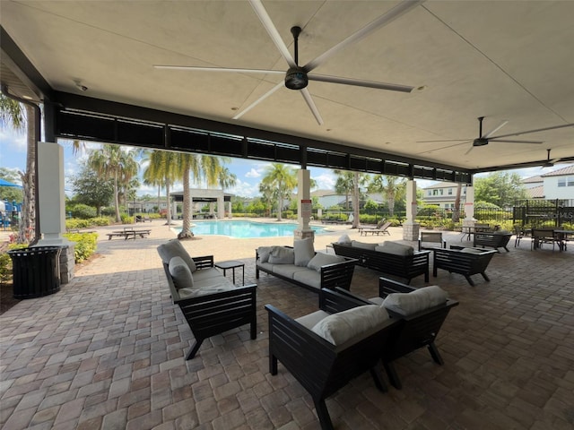 view of patio featuring a ceiling fan and an outdoor hangout area