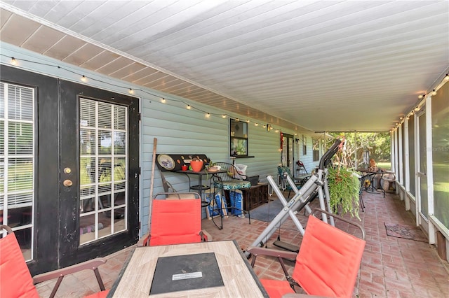view of patio featuring french doors and outdoor dining space