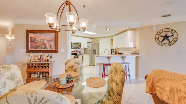 dining space with recessed lighting, light tile patterned floors, ornamental molding, an inviting chandelier, and visible vents