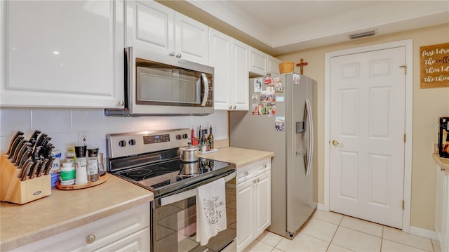 kitchen featuring white cabinetry, visible vents, and appliances with stainless steel finishes
