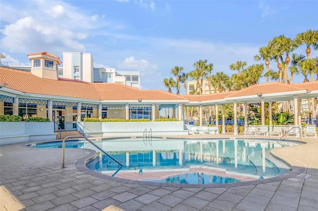 pool featuring a patio