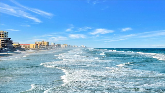 view of water feature with a beach view