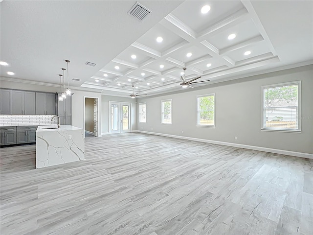 278 Acorn Dr, Longwood, FL 32750 - unfurnished living room with recessed lighting, coffered ceiling, ceiling fan with notable chandelier, and a sink