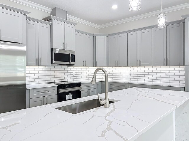 278 Acorn Dr, Longwood, FL 32750 - kitchen featuring a sink, electric range, gray cabinets, stainless steel microwave, and decorative backsplash