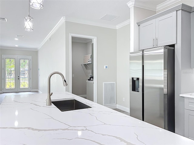 278 Acorn Dr, Longwood, FL 32750 - kitchen with ornamental molding, a sink, visible vents, and stainless steel refrigerator with ice dispenser