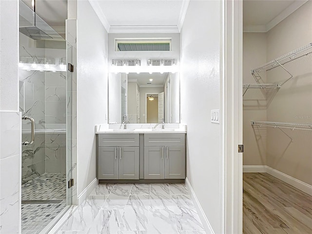 278 Acorn Dr, Longwood, FL 32750 - full bathroom featuring a spacious closet, a marble finish shower, baseboards, and ornamental molding