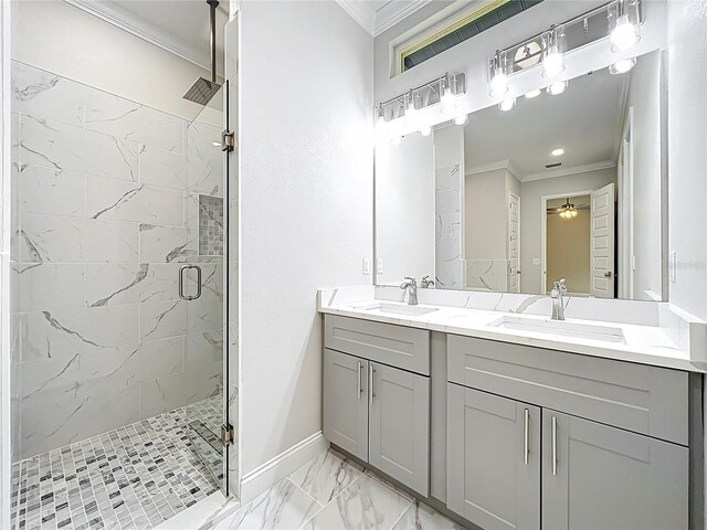 278 Acorn Dr, Longwood, FL 32750 - bathroom featuring crown molding, marble finish floor, a stall shower, and a sink