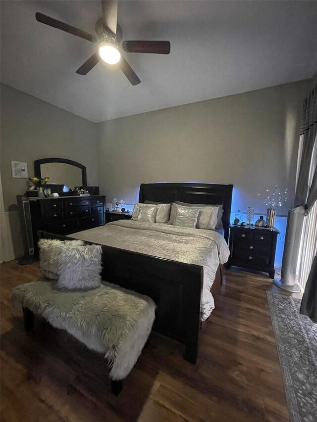 447 Cadiz Loop, Davenport, FL 33837 - bedroom featuring a ceiling fan and wood finished floors