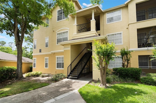 2652 Robert Trend Jones Unit 2652, Orlando, FL 32835 - view of property with stairs