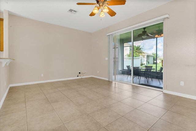 2975 White Cedar Cir, Kissimmee, FL 34741 - spare room featuring a ceiling fan and light tile patterned floors