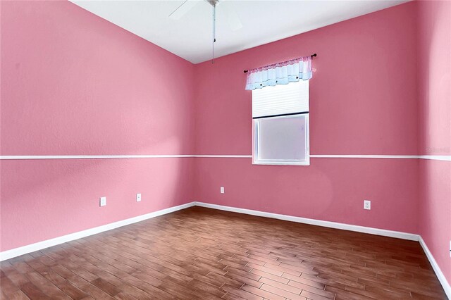 2975 White Cedar Cir, Kissimmee, FL 34741 - unfurnished room featuring wood finished floors and ceiling fan