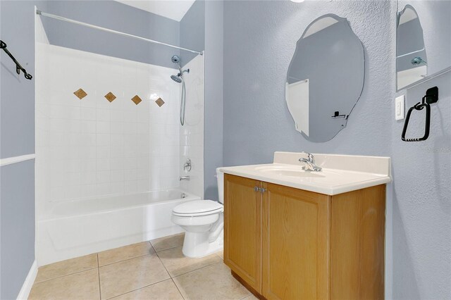 2975 White Cedar Cir, Kissimmee, FL 34741 - bathroom with vanity, shower / washtub combination, tile patterned floors, and a textured wall