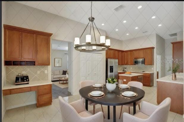 626 Green Rock Ct, Apopka, FL 32712 - dining room with a chandelier, recessed lighting, and light tile patterned flooring