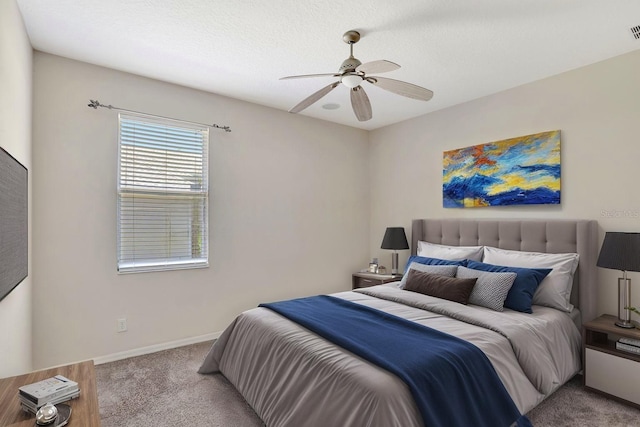 626 Green Rock Ct, Apopka, FL 32712 - carpeted bedroom with a ceiling fan and baseboards