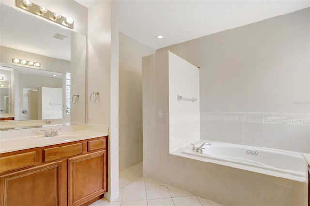 626 Green Rock Ct, Apopka, FL 32712 - full bath featuring a garden tub, vanity, and tile patterned floors