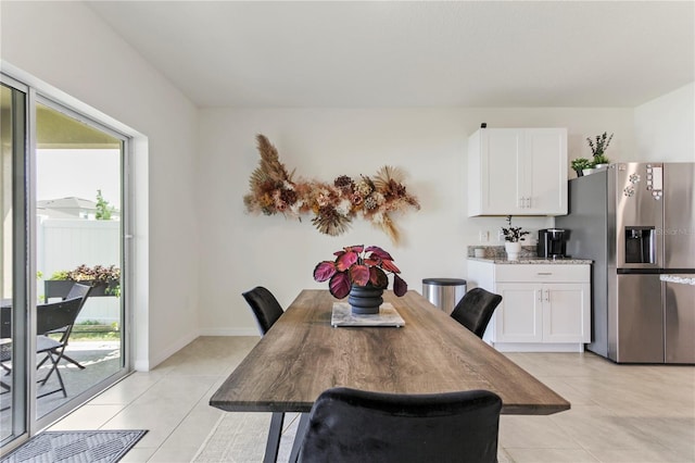 1975 Cacutta Way, Kissimmee, FL 34744 - dining space with light tile patterned floors