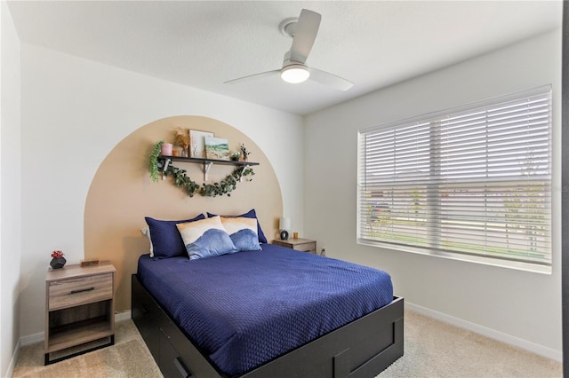 1975 Cacutta Way, Kissimmee, FL 34744 - carpeted bedroom featuring baseboards and ceiling fan