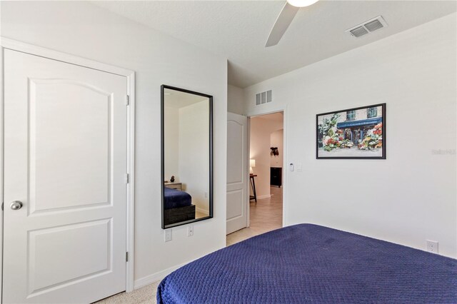 1975 Cacutta Way, Kissimmee, FL 34744 - bedroom with a ceiling fan and baseboards