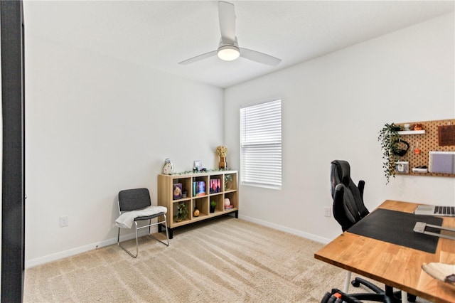 1975 Cacutta Way, Kissimmee, FL 34744 - home office featuring a ceiling fan, carpet floors, and baseboards