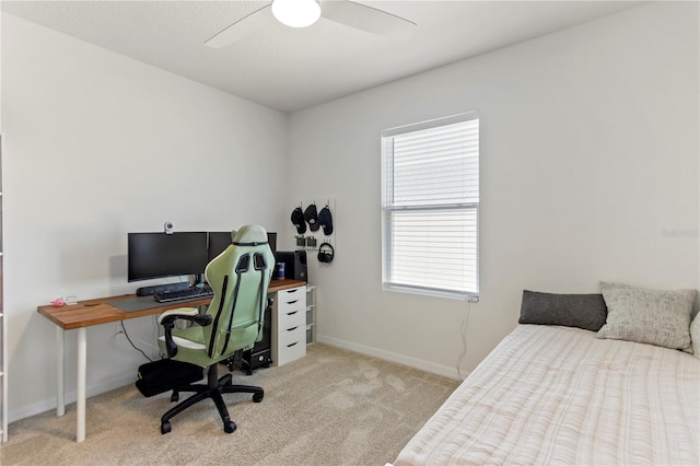 1975 Cacutta Way, Kissimmee, FL 34744 - carpeted bedroom with a desk, baseboards, and a ceiling fan