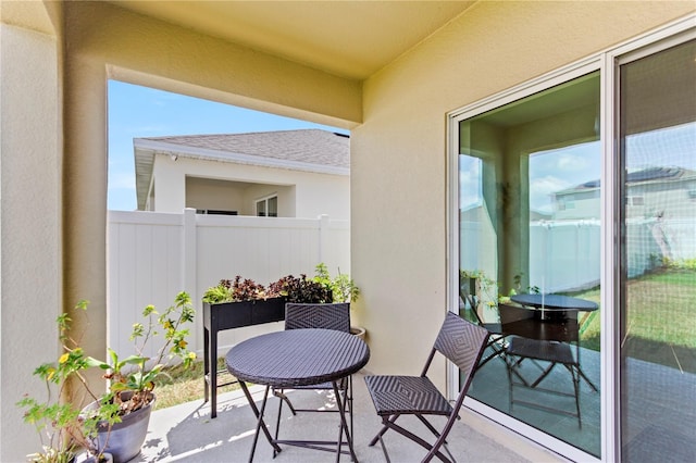 1975 Cacutta Way, Kissimmee, FL 34744 - balcony with a patio area