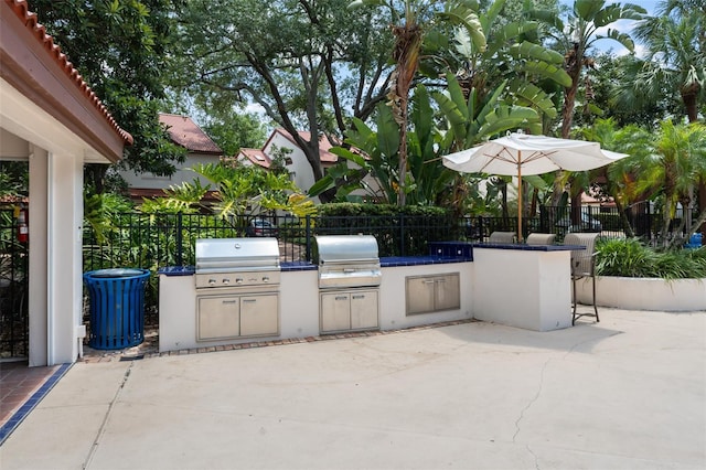 546 Via Fontana Dr Unit 203, Altamonte Springs, FL 32714 - view of patio / terrace featuring fence, area for grilling, and a grill