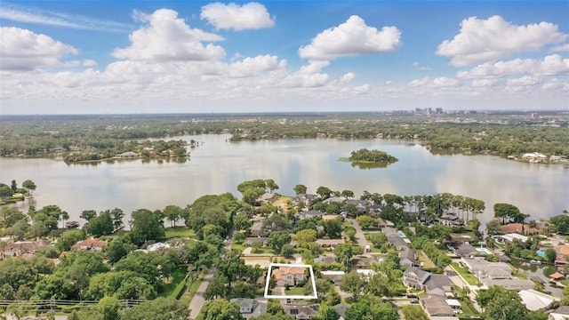 aerial overview of property's location featuring a nearby body of water and property boundaries highlighted