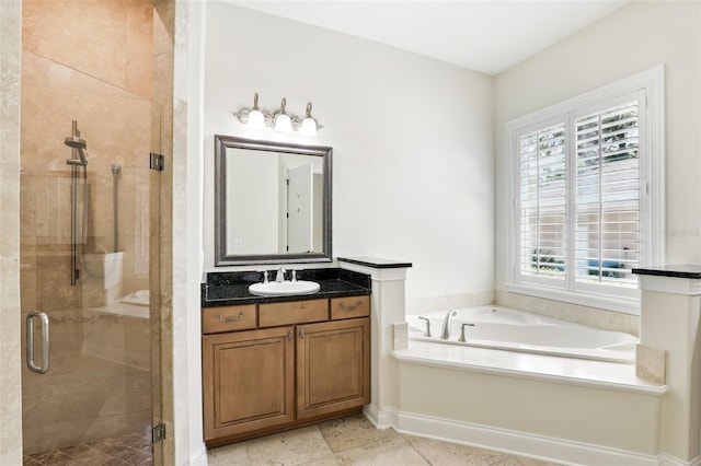 full bath with a shower stall, a bath, and vanity