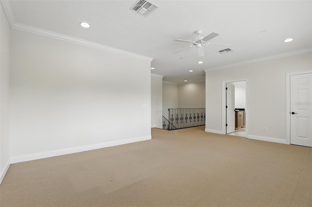 spare room with crown molding, baseboards, recessed lighting, ceiling fan, and light colored carpet