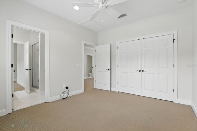 unfurnished bedroom with carpet floors, baseboards, a ceiling fan, and a closet
