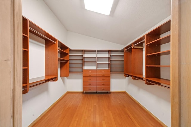 4265 Conway Place Cir, Orlando, FL 32812 - walk in closet featuring wood finished floors and lofted ceiling