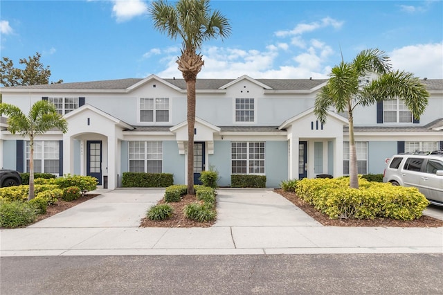 7663 Fitzclarence St, Kissimmee, FL 34747 - view of front of house with stucco siding
