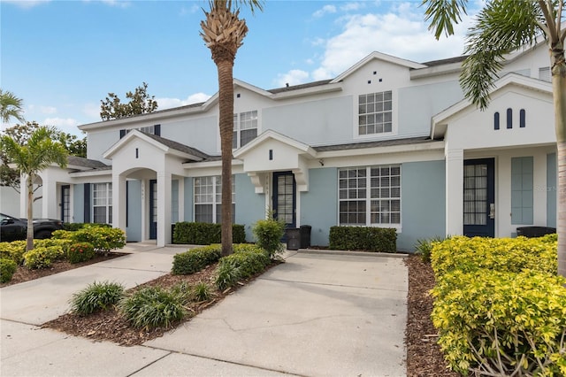 7663 Fitzclarence St, Kissimmee, FL 34747 - view of front of house featuring stucco siding