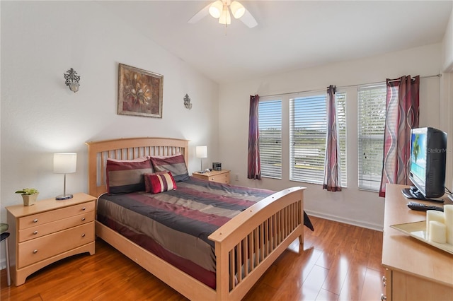 7663 Fitzclarence St, Kissimmee, FL 34747 - bedroom featuring vaulted ceiling, wood finished floors, and ceiling fan