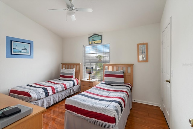 7663 Fitzclarence St, Kissimmee, FL 34747 - bedroom with wood finished floors, ceiling fan, and lofted ceiling