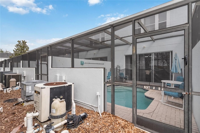 7663 Fitzclarence St, Kissimmee, FL 34747 - outdoor pool with a lanai, a patio area, and cooling unit
