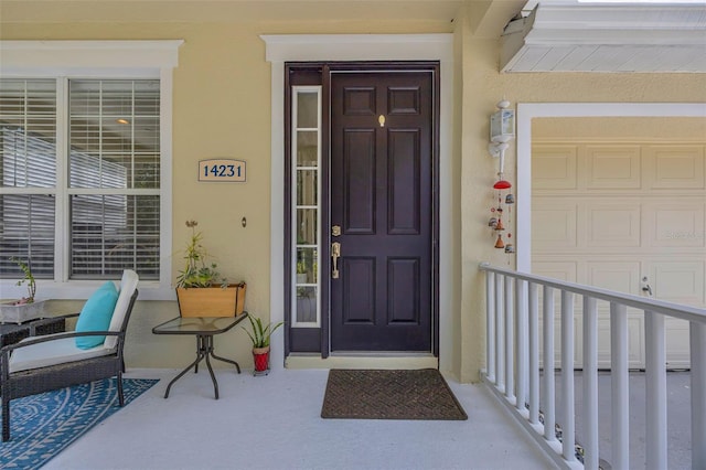 14231 Sonco Ave, Windermere, FL 34786 - property entrance featuring stucco siding and covered porch