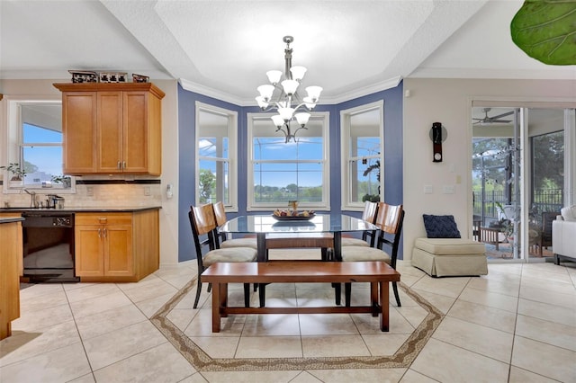 14231 Sonco Ave, Windermere, FL 34786 - dining area featuring a chandelier, crown molding, light tile patterned flooring, and inlaid floor details